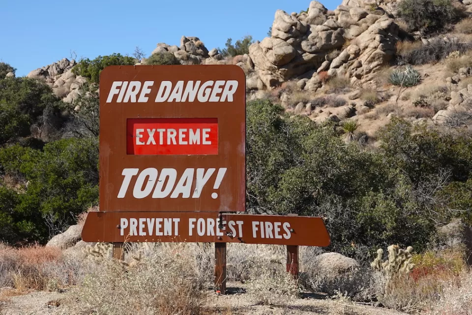 Roadside "Fire Danger Extreme Today!" sign in Cleveland National Forest, California.